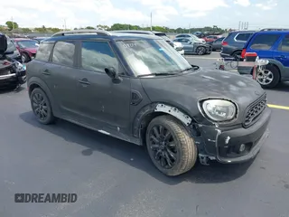 2018 MINI Countryman Cooper S z VIN WMZYT3C35J3E00804, wystawiony jako IAAI lot #42194381 z przebiegiem 101 634 mil mil oraz . Historia ofert i sprzedaży dostępna na DreamBid. Obrazek 1.