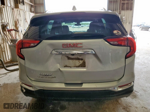 2020 GMC Terrain SLT z VIN 3GKALPEV8LL143945, wystawiony jako Copart lot #63500555 z przebiegiem 121 890 mil mil oraz Szkoda całkowita • Salvage title. Historia ofert i sprzedaży dostępna na DreamBid. Obrazek 6.