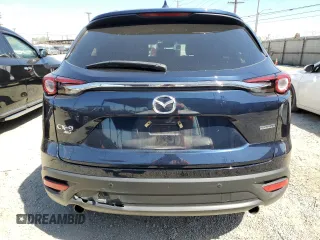 2022 Mazda CX-9 Touring z VIN JM3TCBCY5N0627731, wystawiony jako Copart lot #52804985 z przebiegiem 24 425 mil mil oraz Szkoda całkowita • Salvage title. Historia ofert i sprzedaży dostępna na DreamBid. Obrazek 6.