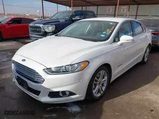 2015 Ford Fusion Titanium Hybrid with VIN 3FA6P0RU9FR308973, listed as a IAAI auction lot 41754320 with 82,686 mi miles. Bid and sale history available at carsss.com. Image 17.