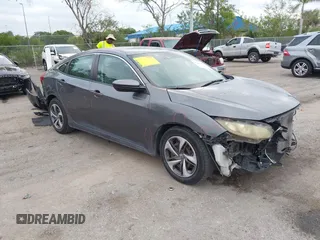 2019 Honda Civic Sedan LX with VIN 19XFC2F66KE024399, listed as a IAAI auction lot 42023498 with 50,173 mi miles. Bid and sale history available at carsss.com. Image 1.