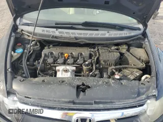 2006 Honda Civic LX z VIN 1HGFA165X6L088161, wystawiony jako Copart lot #53868135 z przebiegiem 183 370 mil mil oraz Szkoda całkowita • Salvage title. Historia ofert i sprzedaży dostępna na DreamBid. Obrazek 11.