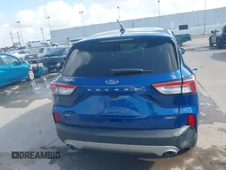 2022 Ford Escape SE Hybrid with VIN 1FMCU9BZ9NUA39229, listed as a IAAI auction lot 42447009 with 39,657 mi miles and . Bid and sale history available at DreamBid. Image 16.