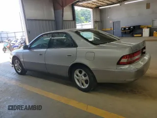 2001 Lexus ES 300 z VIN JT8BF28G910303864, wystawiony jako Copart lot #61811935 z przebiegiem 159 696 mil mil oraz Szkoda całkowita • Salvage title. Historia ofert i sprzedaży dostępna na DreamBid. Obrazek 2.