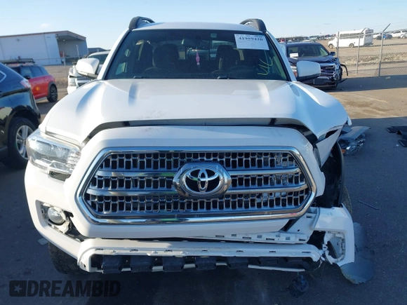 2017 Toyota Tacoma SR5 z VIN 3TMCZ5AN9HM061737, wystawiony jako IAAI lot #41959420 z przebiegiem 86 395 mil mil oraz . Historia ofert i sprzedaży dostępna na DreamBid. Obrazek 12.