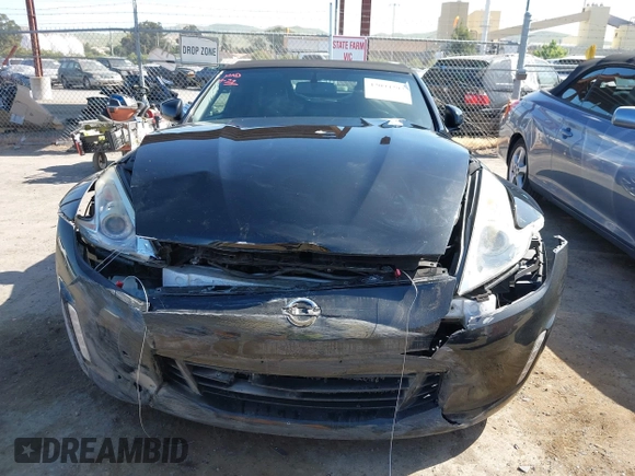 2014 Nissan 370Z Touring with VIN JN1AZ4FH8EM620208, listed as a IAAI auction lot 42094292 with 68,799 mi miles and . Bid and sale history available at DreamBid. Image 12.