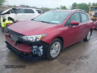 2018 Subaru Impreza Premium z VIN 4S3GTAB63J3720910, wystawiony jako IAAI lot #42331367 z przebiegiem 59 216 mil mil oraz . Historia ofert i sprzedaży dostępna na DreamBid. Obrazek 2.