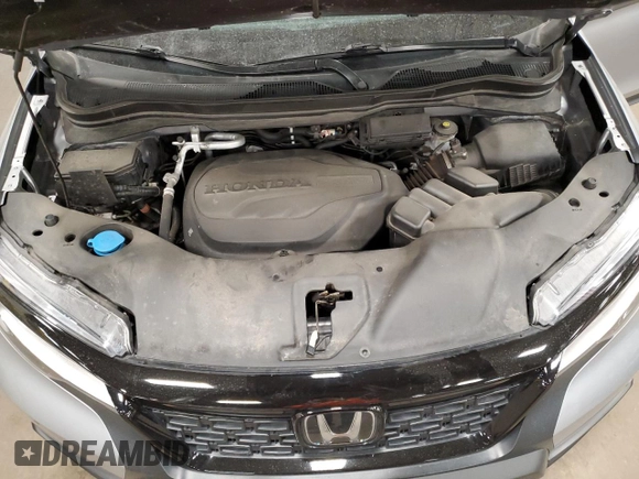 2021 Honda Passport Touring with VIN 5FNYF8H92MB016307, listed as a Copart auction lot 53087325 with 77,126 mi miles and Salvage Title. Bid and sale history available at carsss.com. Image 12.