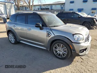 2017 MINI Countryman Cooper S with VIN WMZYT5C38H3D79260, listed as a Copart auction lot 86428984 with 110,407 mi miles and Salvage title. Bid and sale history available at DreamBid. Image 4.