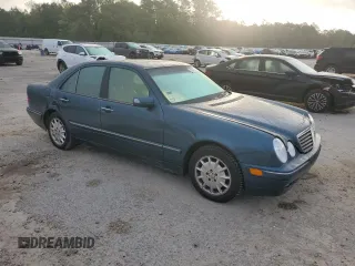 2000 Mercedes-Benz E-Class with VIN WDBJF65J1YB103093, listed as a Copart auction lot 51587325 with 208,350 mi miles and Salvage Title. Bid and sale history available at carsss.com. Image 4.