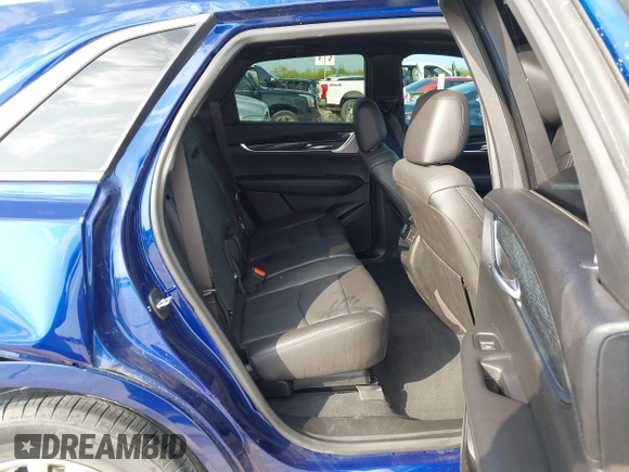 2023 Cadillac XT5 FWD Premium Luxury with VIN 1GYKNCRS4PZ151486, listed as a IAAI auction lot 42099826 with 42,274 mi miles and . Bid and sale history available at DreamBid. Image 8.