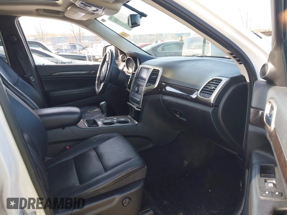2012 Jeep Grand Cherokee Laredo with VIN 1C4RJFAG6CC279427, listed as a IAAI auction lot 41956034 with 86,689 mi miles. Bid and sale history available at carsss.com. Image 5.