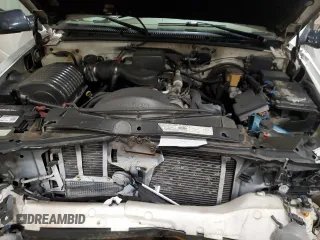 2000 Cadillac Escalade z VIN 1GYEK63R0YR185780, wystawiony jako Copart lot #80620994 z przebiegiem 16 717 mil mil oraz Szkody całkowita. Historia ofert i sprzedaży dostępna na DreamBid. Obrazek 12.