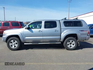 2014 Toyota Tacoma with VIN 3TMLU4EN7EM146705, listed as a IAAI auction lot 41949827 with 147,887 mi miles and . Bid and sale history available at DreamBid. Image 14.