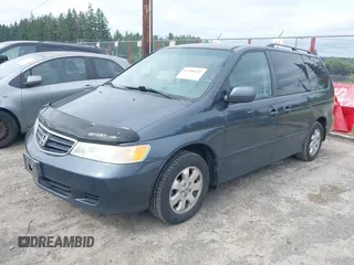 2004 Honda Odyssey EX-L with VIN 5FNRL18064B066763, listed as a IAAI auction lot 42588622 with 499,993 mi miles and . Bid and sale history available at DreamBid. Image 2.