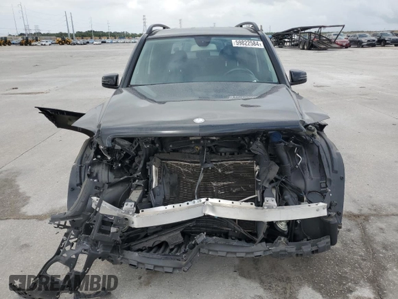 2015 Mercedes-Benz GLK 350 with VIN WDCGG5HB4FG441590, listed as a Copart auction lot 59822584 with 124,186 mi miles and Salvage Title. Bid and sale history available at DreamBid. Image 5.
