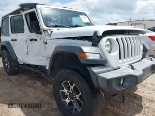 2018 Jeep Wrangler Unlimited Sport S z VIN 1C4HJXDG4JW298647, wystawiony jako IAAI lot #41930817 z przebiegiem 64 761 mil mil oraz . Historia ofert i sprzedaży dostępna na DreamBid. Obrazek 1.
