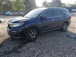 2019 Honda Pilot Touring 7-Passenger with VIN 5FNYF6H64KB024920, listed as a Copart auction lot 57213235 with 112,026 mi miles and Salvage title. Bid and sale history available at DreamBid. Image 1.