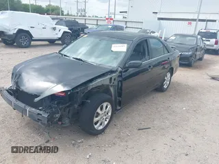 2005 Toyota Camry LE with VIN 4T1BF32K15U091945, listed as a IAAI auction lot 42124503 with 212,951 mi miles and . Bid and sale history available at DreamBid. Image 19.
