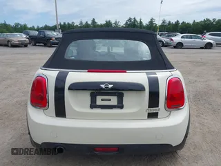 2019 MINI Convertible Cooper z VIN WMWWG5C52K3F79780, wystawiony jako IAAI lot #42622429 z przebiegiem 38 532 mil mil oraz . Historia ofert i sprzedaży dostępna na DreamBid. Obrazek 16.