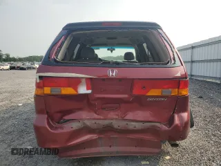 2004 Honda Odyssey EX-L with VIN 5FNRL18024B008617, listed as a Copart auction lot 58831435 with Not provided miles and Salvage title. Bid and sale history available at DreamBid. Image 6.