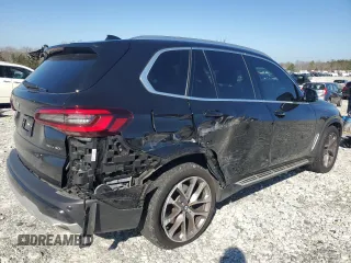 2023 BMW X5 sDrive40i with VIN 5UXCR4C06P9P01409, listed as a Copart auction lot 43127395 with 27,564 mi miles and Salvage Title. Bid and sale history available at carsss.com. Image 3.