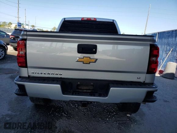 2017 Chevrolet Silverado 1500 LT with VIN 3GCUKREC0HG470703, listed as a Copart auction lot 53667145 with 167,689 mi miles and Salvage Title. Bid and sale history available at DreamBid. Image 6.