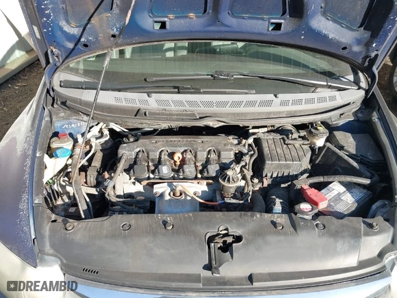 2009 Honda Civic Sdn LX with VIN 2HGFA16559H544472, listed as a IAAI auction lot 41695513 with 124,845 mi miles. Bid and sale history available at carsss.com. Image 10.