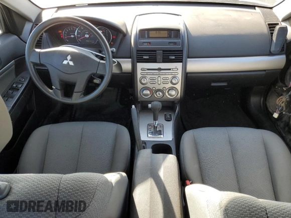 2011 Mitsubishi Galant FE z VIN 4A32B2FF4BE014769, wystawiony jako Copart lot #68899874 z przebiegiem 87 681 mil mil oraz Nie do naprawy • Non repairable. Historia ofert i sprzedaży dostępna na DreamBid. Obrazek 8.