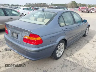 2005 BMW 3 Series 325i with VIN WBAET37445NJ85538, listed as a IAAI auction lot 41872686 with 121,237 mi miles. Bid and sale history available at carsss.com. Image 4.