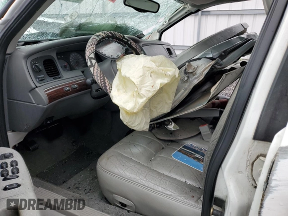 2003 Mercury Grand Marquis LS Premium with VIN 2MEFM75W13X667779, listed as a Copart auction lot 52869985 with 127,506 mi miles and Salvage Title. Bid and sale history available at DreamBid. Image 7.