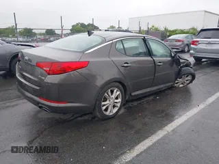 2013 Kia Optima EX with VIN 5XXGN4A78DG127294, listed as a IAAI auction lot 42364450 with 142,722 mi miles and . Bid and sale history available at DreamBid. Image 4.