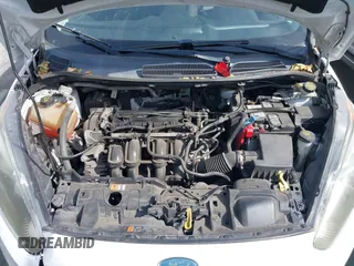 2016 Ford Fiesta S z VIN 3FADP4TJ6GM171745, wystawiony jako IAAI lot #41924984 z przebiegiem 111 925 mil mil oraz . Historia ofert i sprzedaży dostępna na DreamBid. Obrazek 10.