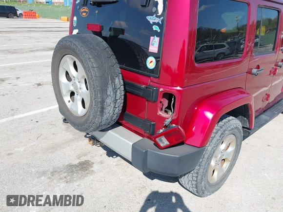 2013 Jeep Wrangler Unlimited Sahara с VIN 1C4BJWEG5DL569977, выставлен на аукционе IAAI как лот 41980394 с пробегом 145 571 миль миль и . История ставок и продаж доступна на DreamBid. Изображение 17.