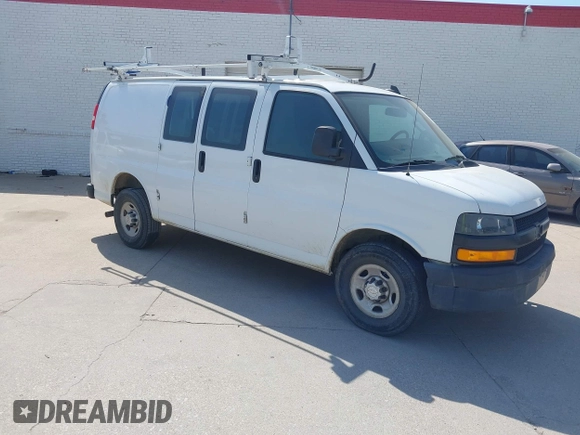 2019 Chevrolet Express Cargo Van with VIN 1GCWGAFPXK1164773, listed as a IAAI auction lot 41984554 with 87,916 mi miles. Bid and sale history available at carsss.com. Image 1.
