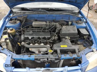 2001 Hyundai Accent z VIN KMHCF35G11U112976, wystawiony jako Copart lot #68692384 z przebiegiem 152 797 mil mil oraz Szkoda całkowita • Salvage title. Historia ofert i sprzedaży dostępna na DreamBid. Obrazek 11.