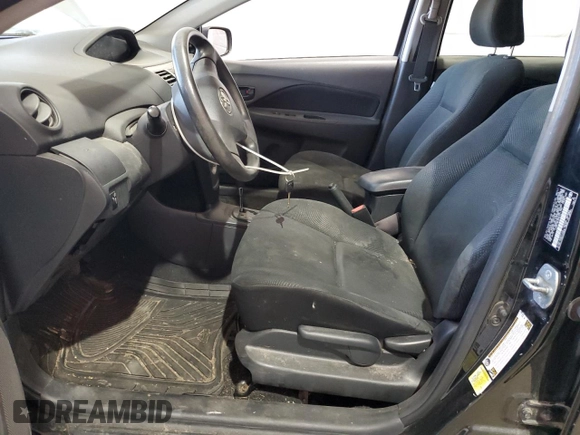 2012 Toyota Yaris with VIN JTDBT4K33CL011799, listed as a Copart auction lot 55105035 with 114,522 mi miles and Clean Title. Bid and sale history available at DreamBid. Image 7.