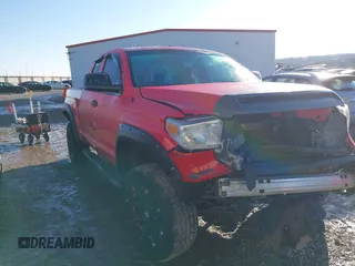 2016 Toyota Tundra 4WD Truck SR with VIN 5TFUM5F16GX064645, listed as a IAAI auction lot 41614790 with 144,400 mi miles. Bid and sale history available at carsss.com. Image 1.