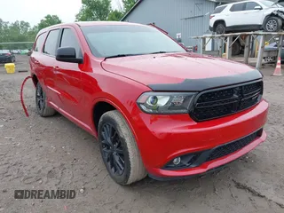 2015 Dodge Durango SXT with VIN 1C4RDJAG2FC128082, listed as a IAAI auction lot 42447872 with 141,655 mi miles and . Bid and sale history available at DreamBid. Image 1.