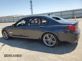 2014 BMW 7 Series ALPINA B7 with VIN WBAYE8C55ED136454, listed as a Copart auction lot 55589525 with 119,761 mi miles and Salvage title. Bid and sale history available at DreamBid. Image 2.