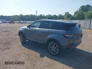 2015 Land Rover Range Rover Evoque Pure Plus z VIN SALVP2BG8FH047528, wystawiony jako IAAI lot #42466907 z przebiegiem 100 941 mil mil oraz . Historia ofert i sprzedaży dostępna na DreamBid. Obrazek 3.