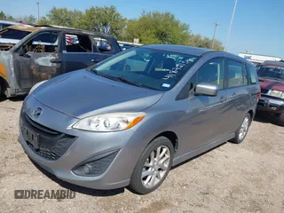 2012 Mazda Mazda5 Grand Touring with VIN JM1CW2DL2C0129518, listed as a IAAI auction lot 41872136 with 129,323 mi miles. Bid and sale history available at carsss.com. Image 2.