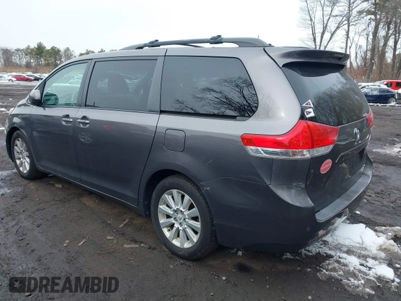 2012 Toyota Sienna XLE with VIN 5TDDK3DC9CS047014, listed as a IAAI auction lot 41551585 with 164,440 mi miles. Bid and sale history available at carsss.com. Image 3.