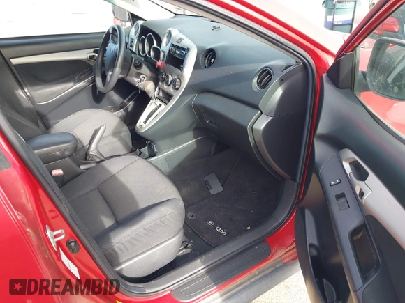 2009 Pontiac Vibe with VIN 5Y2SM67009Z401692, listed as a IAAI auction lot 41769199 with 143,904 mi miles. Bid and sale history available at carsss.com. Image 5.