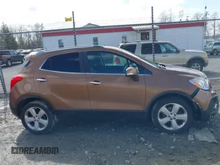 2016 Buick Encore Leather with VIN KL4CJCSB2GB551551, listed as a IAAI auction lot 41635247 with 87,086 mi miles. Bid and sale history available at carsss.com. Image 13.