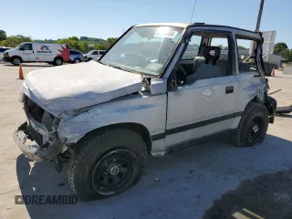 1991 Geo Tracker z VIN 2CNBJ18U3M6909006, wystawiony jako Copart lot #73638944 z przebiegiem 65 033 mil mil oraz Tytuł czysty. Historia ofert i sprzedaży dostępna na DreamBid. Obrazek 1.