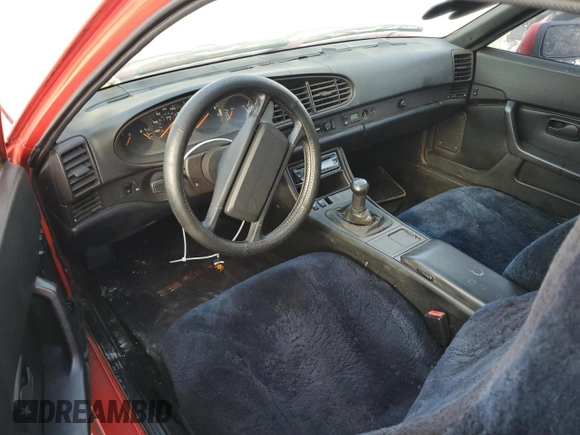 1987 Porsche 944 z VIN WP0AB0946HN476255, wystawiony jako Copart lot #79870704 z przebiegiem 177 672 mil mil oraz Czysty tytuł • Clean title. Historia ofert i sprzedaży dostępna na DreamBid. Obrazek 8.