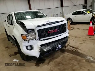 2018 GMC Canyon 4WD Denali z VIN 1GTG6EEN6J1171037, wystawiony jako Copart lot #52521865 z przebiegiem 99 931 mil mil oraz Szkoda całkowita • Salvage title. Historia ofert i sprzedaży dostępna na DreamBid. Obrazek 13.