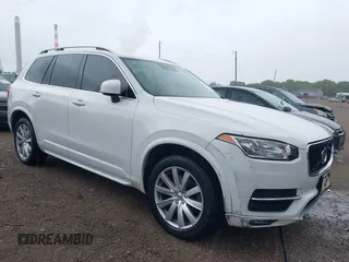 2016 Volvo XC90 T6 Momentum with VIN YV4A22PKXG1023143, listed as a IAAI auction lot 42342022 with 89,446 mi miles and . Bid and sale history available at DreamBid. Image 1.