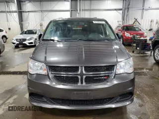 2015 Dodge Grand Caravan SXT with VIN 2C4RDGCG5FR622086, listed as a Copart auction lot 51769155 with 217,538 mi miles and Salvage Title. Bid and sale history available at DreamBid. Image 5.